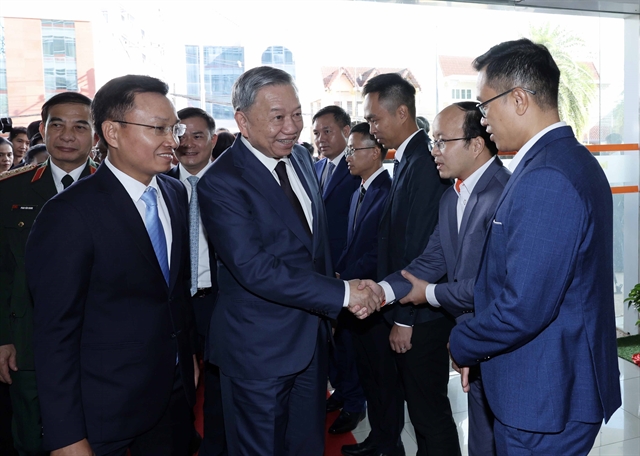 361301_4899642188397147_vna_potal_president_to_lam_visits_telecom_joint_venture_in_laos_7477623