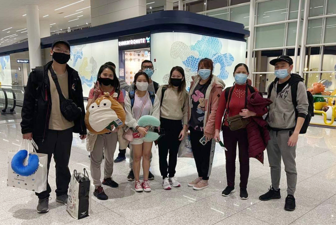 A group of Vietnamese returnees at South Korea before boarding their next trip to Cambodia. They have completed their quarantine requirement on Dec. 7, 2021, and returned home safely. Photo acquired by VnExpress