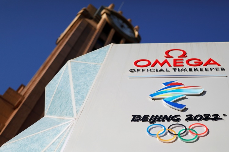 The Beijing 2022 emblem is seen on a countdown clock for the Beijing 2022 Winter Olympic Games in Beijing, China December 7, 2021. Photo by Reuters