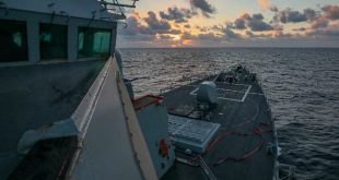 US warship's South China Sea passage sparks Beijing warning