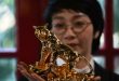 Burning bright: Vietnam's gold-plated new year tiger