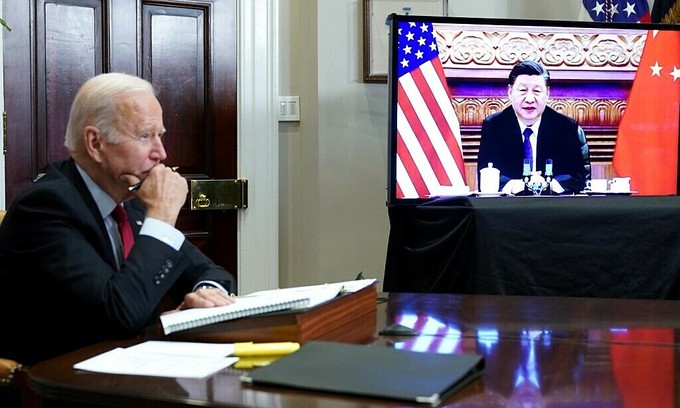 U.S. President Joe Biden speaks virtually with Chinese leader Xi Jinping from the White House in Washington, U.S. November 15, 2021. Photo by AFP