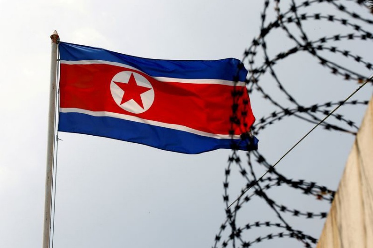 A North Korea flag flutters next to concertina wire at the North Korean embassy in Kuala Lumpur, Malaysia March 9, 2017. Photo by Reuters