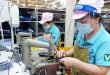 Factories labor to ensure workers return after Tet