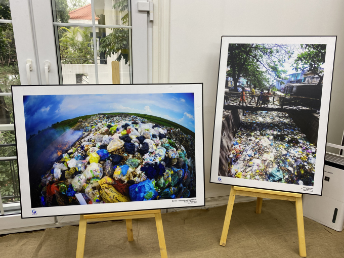 Photos of plastic waste by photographer Nguyen Viet Hung on displayed at the exhibition. Photo by VnExpress/Nhu Quynh