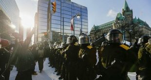 Canadian police arrest dozens to sweep protesters from parliament area