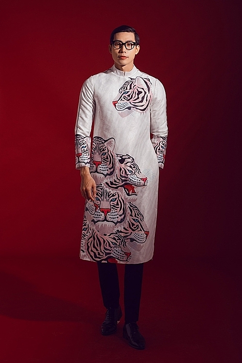 An ao dai showcases strong features of fierce, dominant tiger traits. Tuan said the collection was immediately sold out after its release. Photo by Linh Pham