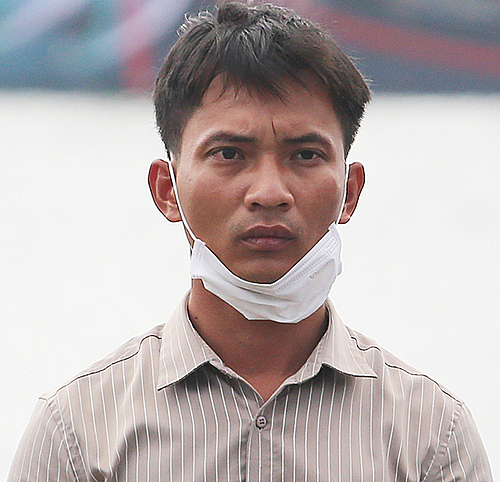 Tran Van Vien, who is now under arrest for killing his daughter. Photo by VnExpress/Dac Thanh