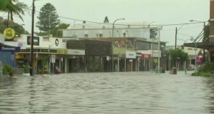 As floods ease, Australia's biggest state braces for damaging surf and wind