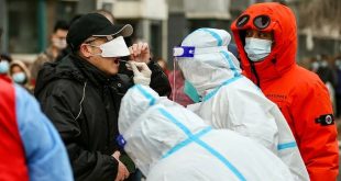 China locks down city of 9 million as virus ripples across country