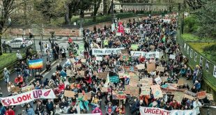 Tens of thousands march in climate protests across France