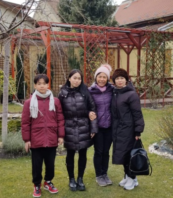 Nguyen Thi Hoa, 1st on the right, with two of her kids, on the left, and a friend in Hungary on March 9, 2022. Photo courtesy of Nguyen Thi Hoa