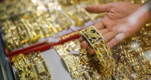 Gold prices plunge from historic peak