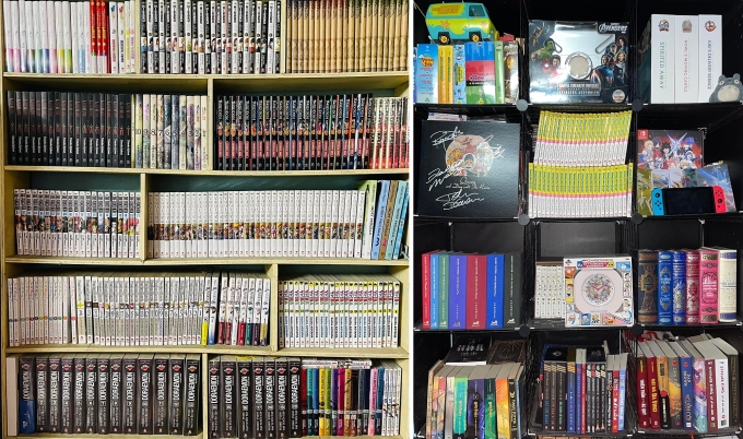 Two bookshelves in Nguyen Hoang Viets house are stacked with comic books. Photo courtesy of Viet