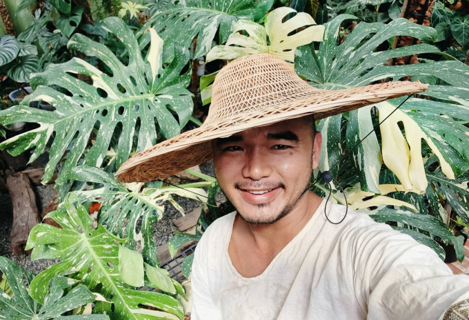 Phu Tue Tri poses for a  photo with his plants at his home in Ninh Thuan Province, March 2022. Photo courtesy of Tri