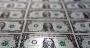 Dollar inches up to new two-year peak, set for best week in four