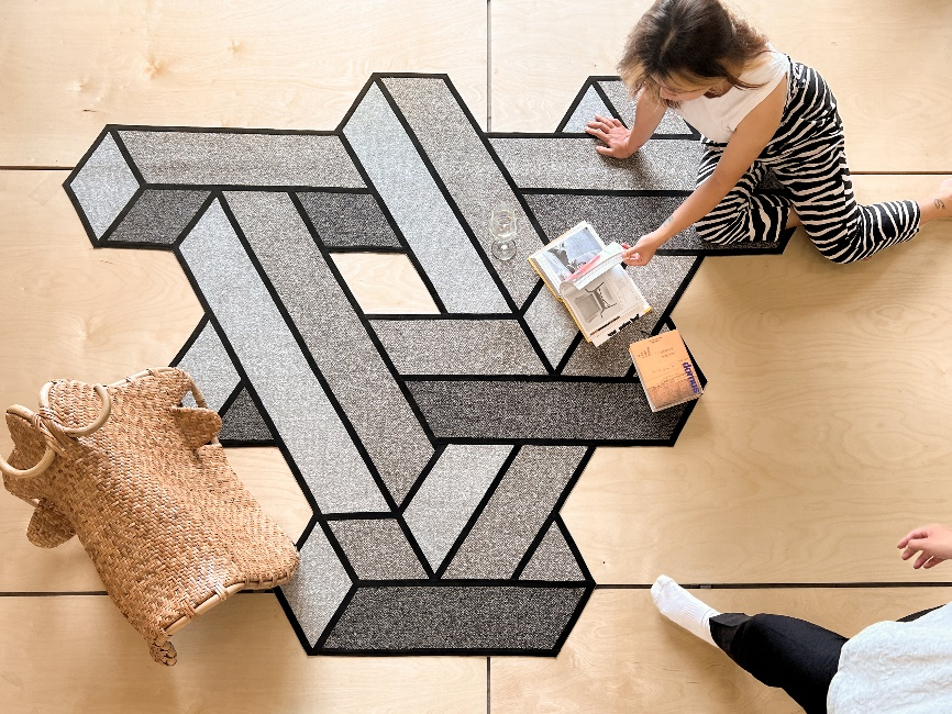 Escher rugs are inspired by Escher’s works in mathematically inspired woodcuts, lithographs and mezzotints. Photo by LAITA