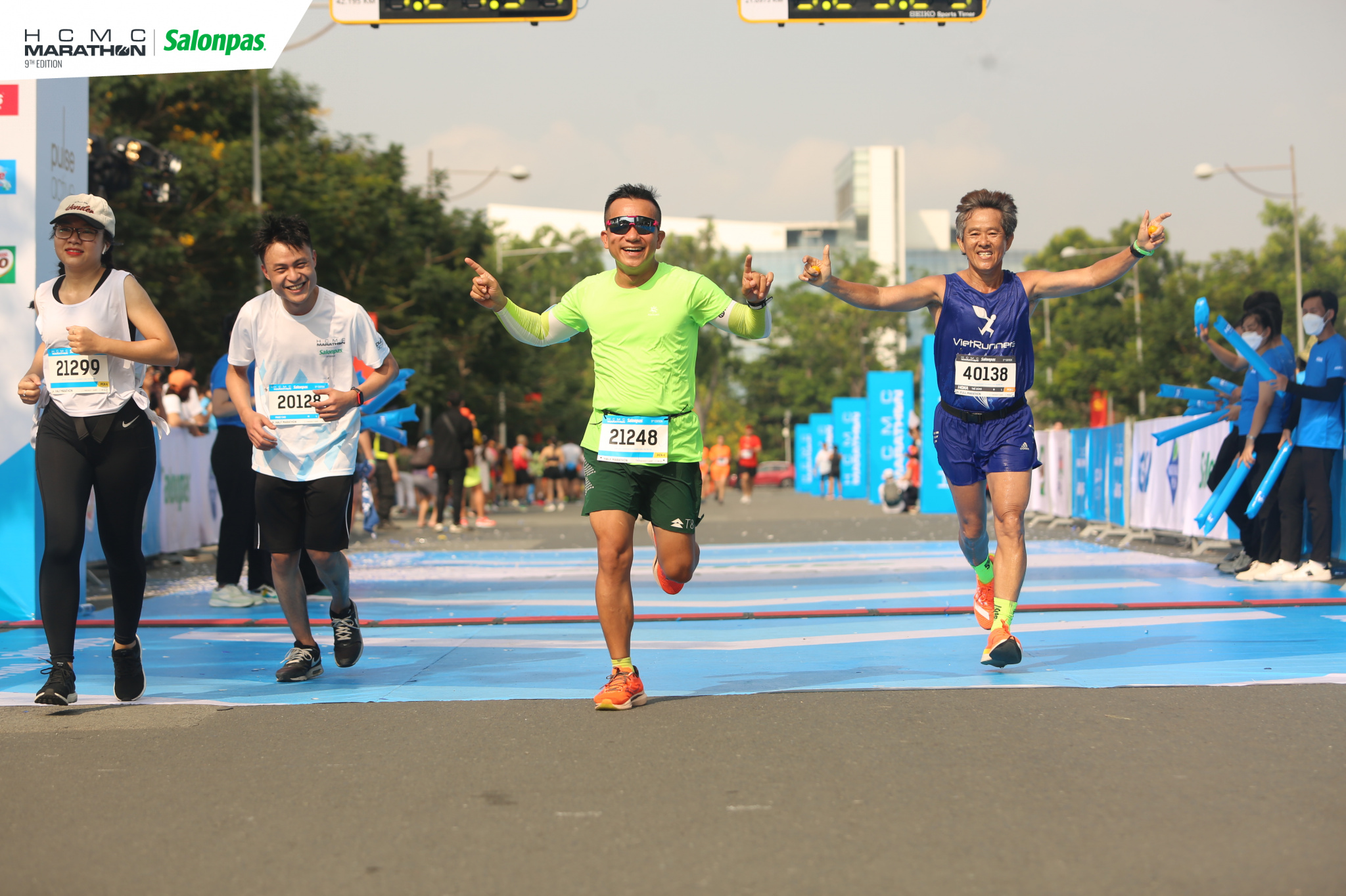 Nguyen The Dung (R) and other runners at the finish line of the HCMC Marathon, April 17, 2022. Photo courtesy of Nguyen The Dung