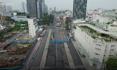 Saigon downtown shopkeepers await reopening as metro construction site cleared