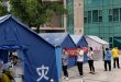 China slashes Covid quarantine time for international travelers