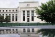 Fed rolls out biggest rate hike since 1994, flags slowing economy