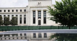 Fed rolls out biggest rate hike since 1994, flags slowing economy