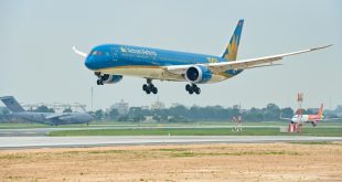 Vietnam Airlines cuts losses by nearly half