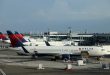 US allows Delta to temporarily cut some New York, Washington flights