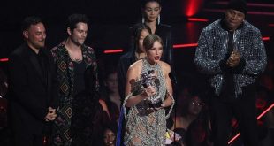 Taylor Swift wins top MTV video award, announces new album