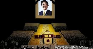 With flowers and a gun salute, Japan bids farewell to Abe at state funeral