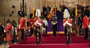 King Charles stands vigil as queen's lying-in-state queue swells