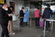China shortens Covid quarantine times, eases flight curbs