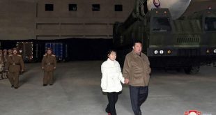 North Korea's Kim reveals daughter at ballistic missile test