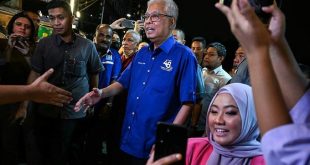 Malaysia votes in general election, Anwar expected to lead tight race