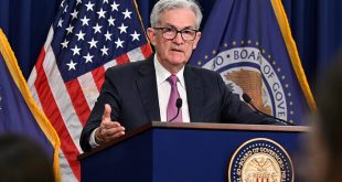 US Fed unveils smaller hike to key interest rate