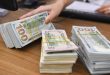 Dollar surges at banks