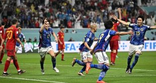 Japan roar back again to shock Spain and top group