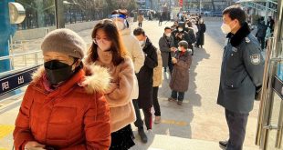 Chinese rush to renew passports as Covid border curbs lifted