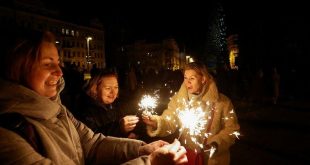 Defiant Ukrainians cheer New Year as drones blasted from skies