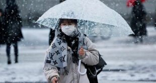 Heavy snow in Japan disrupts flights and trains, closes roads