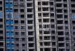 Analysis: China's mortgage rate cuts spur prepayment rush, threaten bank earnings