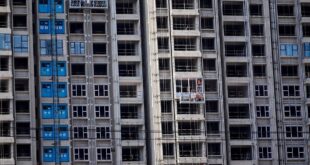 Analysis: China's mortgage rate cuts spur prepayment rush, threaten bank earnings