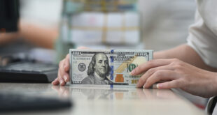 Dollar moves up at banks