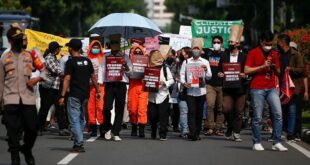 Indonesians seeking climate justice take aim at Swiss concrete giant