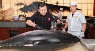 Restaurants rely on giant fish to attract customers on Women's Day