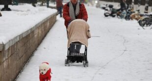 Freezing temperatures, snow, ice blanket China, shutting highways