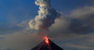 Philippines on alert as volcano spews ash