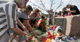 Australia sanctions three involved in downing of MH17