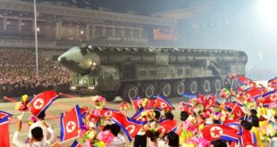 North Korea shows off drones and ballistic missiles at night-time parade