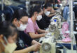 Factories boost wages despite declining orders